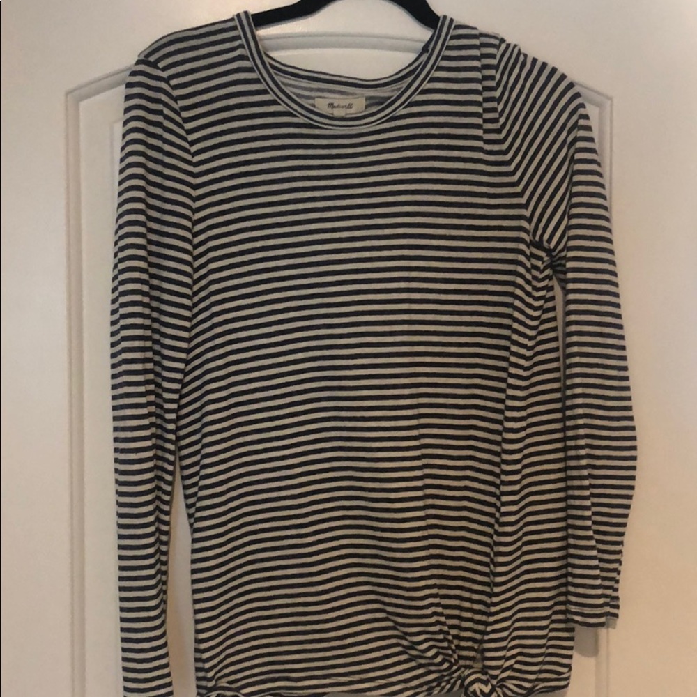Blue and white stripped shirt with a little knot